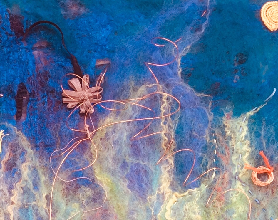 Felting and mixed media.