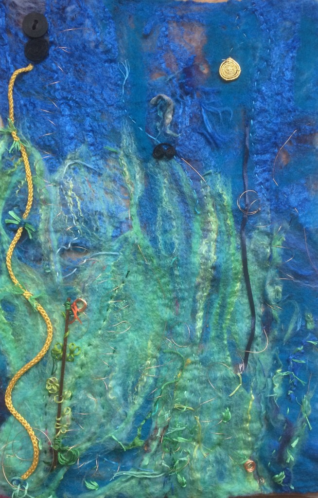 Close up of Diving II mixed media artwork using merino wool, silver wire, copper wire, embroidery silk, found objects.